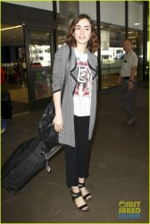 Lily Collins - At LAX - Aug. 28, 2013