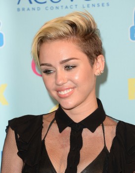 Miley Cyrus attend 2013 Teen Choice awards - Leather Celebrities